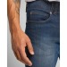 Vaqueros slim fit Extreme Motion, Jean publicidad