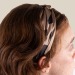 Ruban à cheveux en satin, Bandeau publicidad