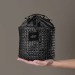 Bourse en raphia, trousse de toilette publicidad